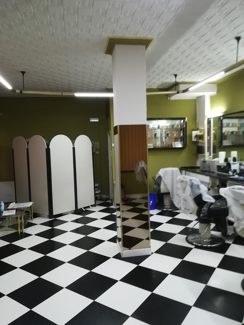 Andrade's 90 Peluqueros